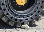 mclaren solid cushion tire on cat backhoe